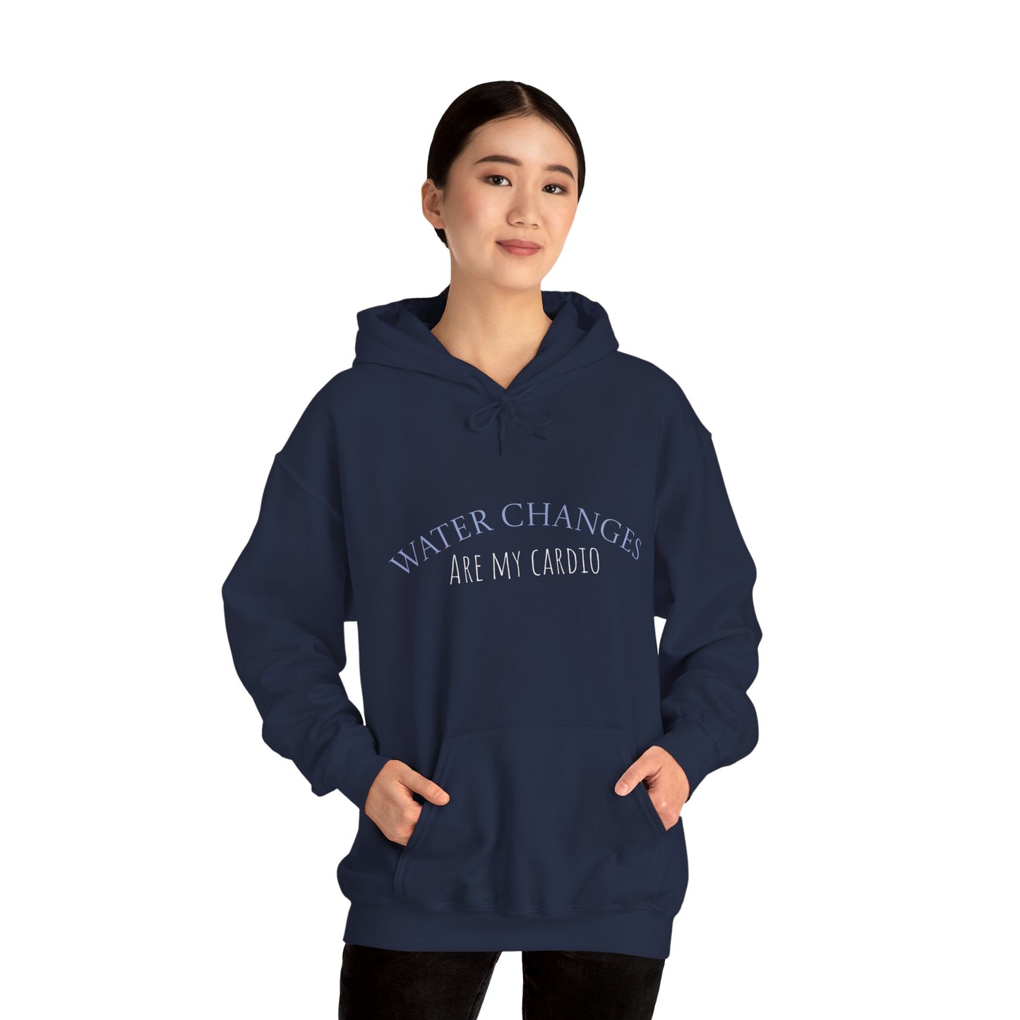 Front view of woman wearing navy “Water Changes Are My Cardio” hoodie with arms at her sides