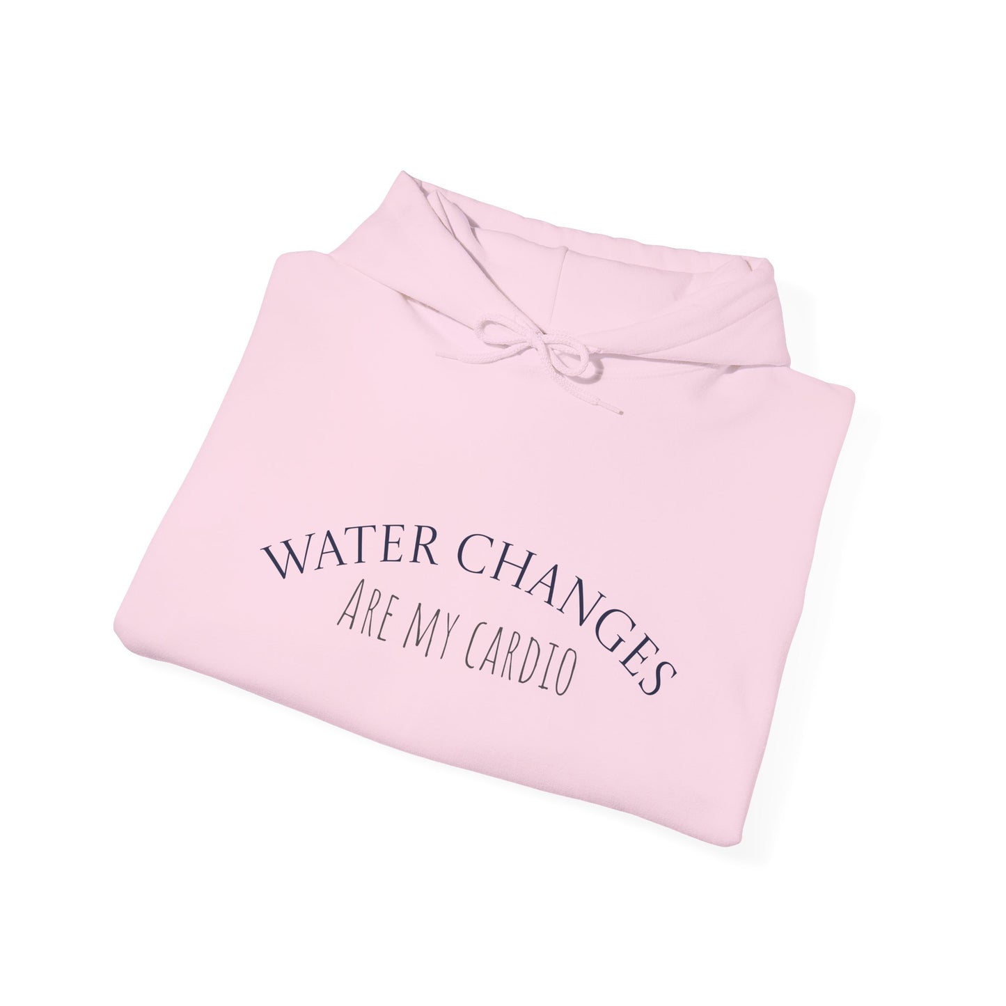 Folded pink hoodie laid flat showing “Water Changes Are My Cardio” graphic on chest