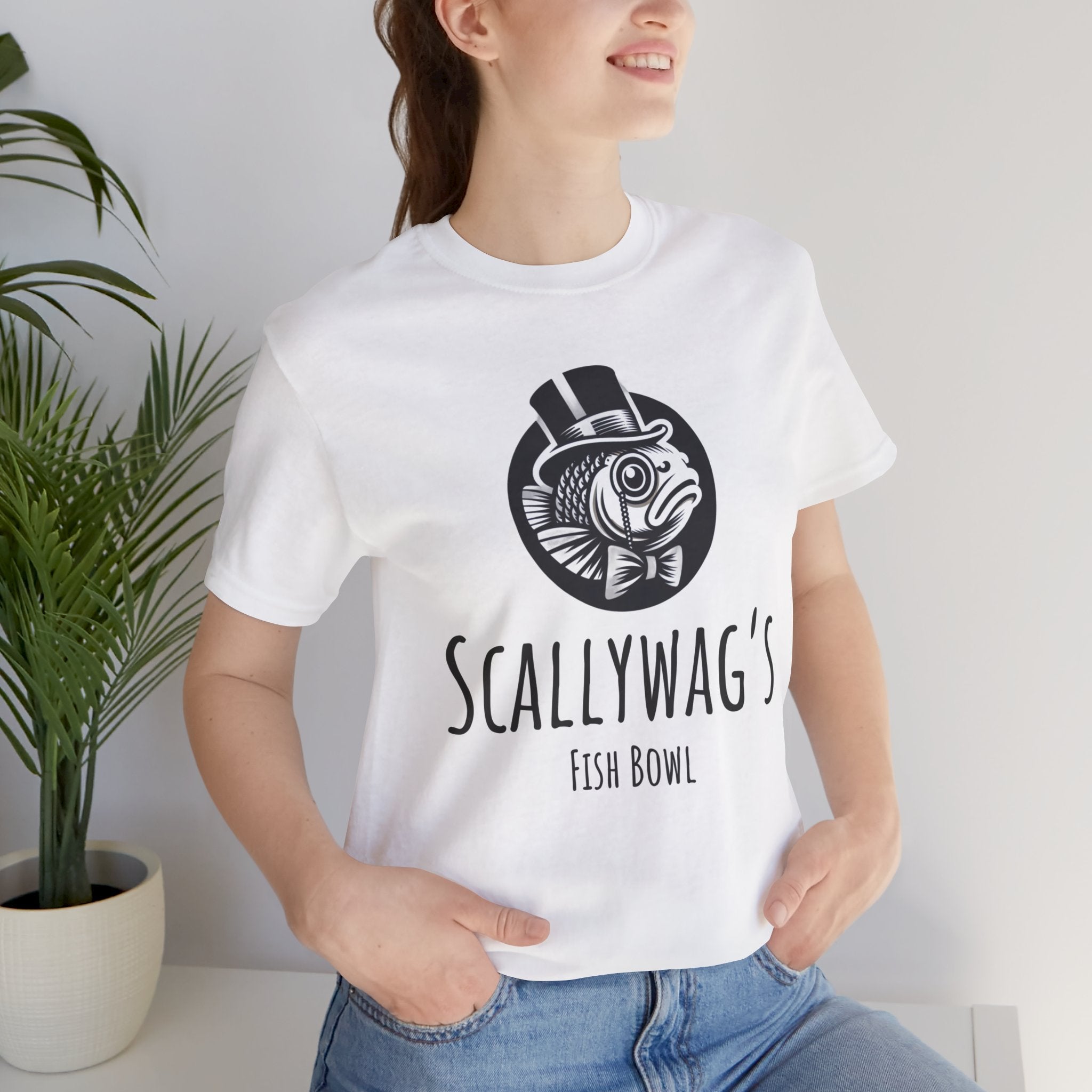 White Scallywag's Fish Bowl Logo Tee by Printify worn by woman with hands in pockets