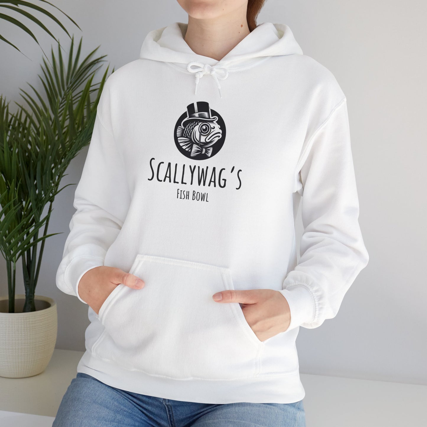 White Oscar fish hoodie with Scallywag's Fish Bowl logo worn by person with hands in front pocket