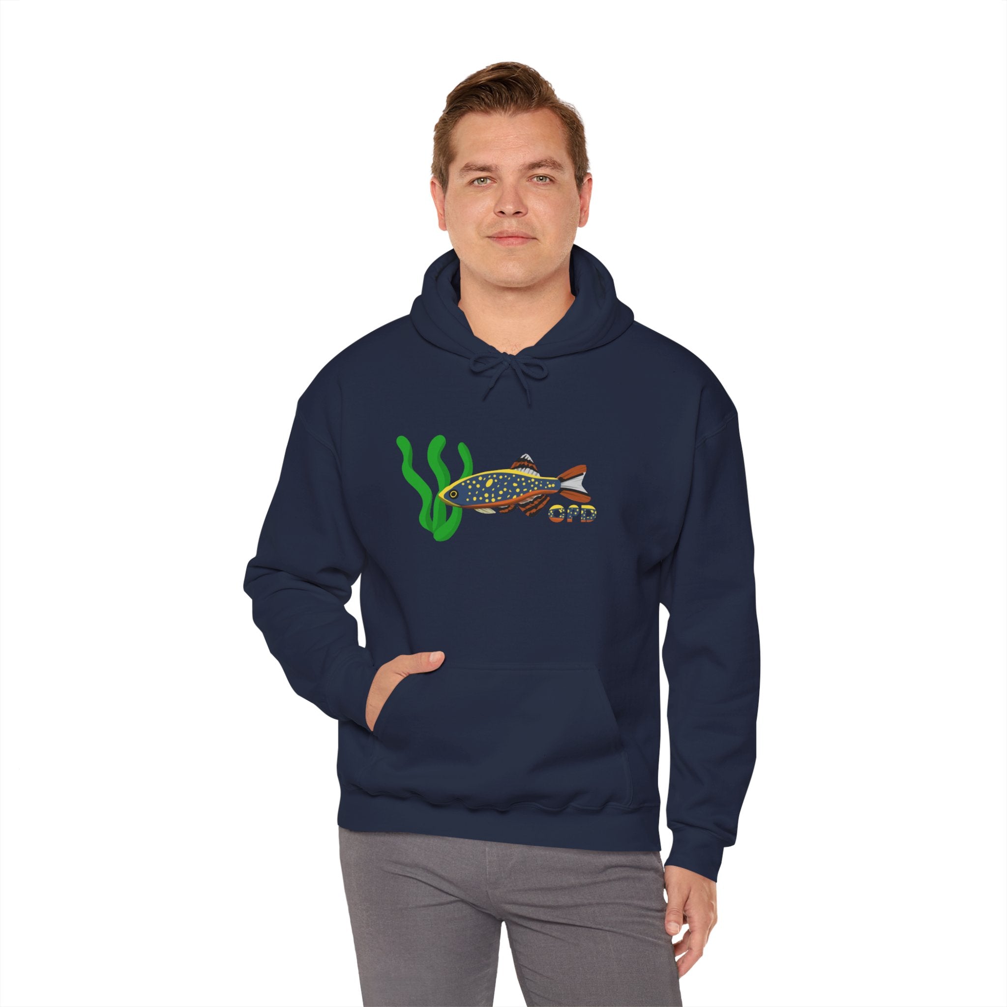 Man in blue hoodie with Galaxy Rasbora fish graphic, one hand in pocket