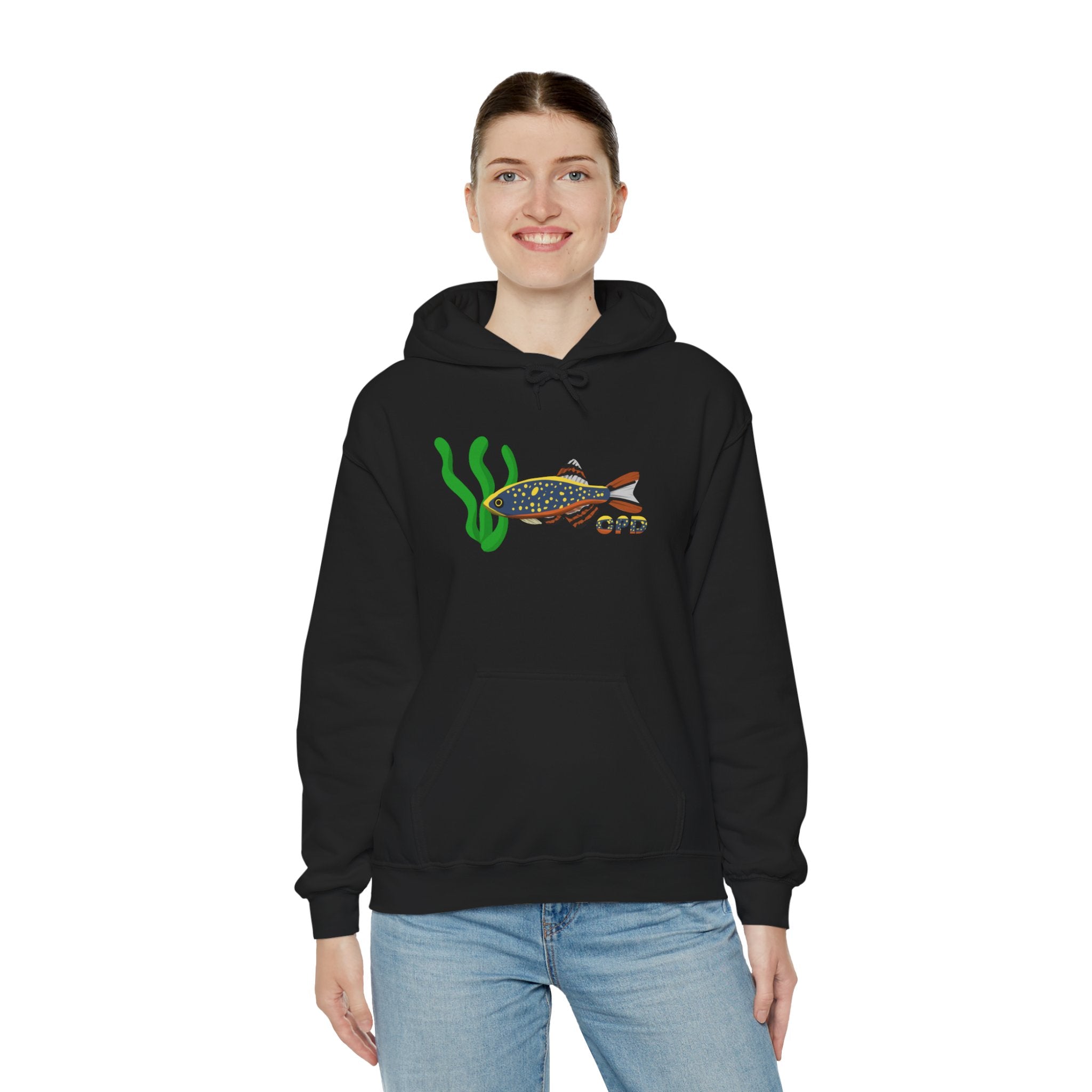 Woman wearing a black Celestial Pearl Danio hoodie with fish and seaweed graphic