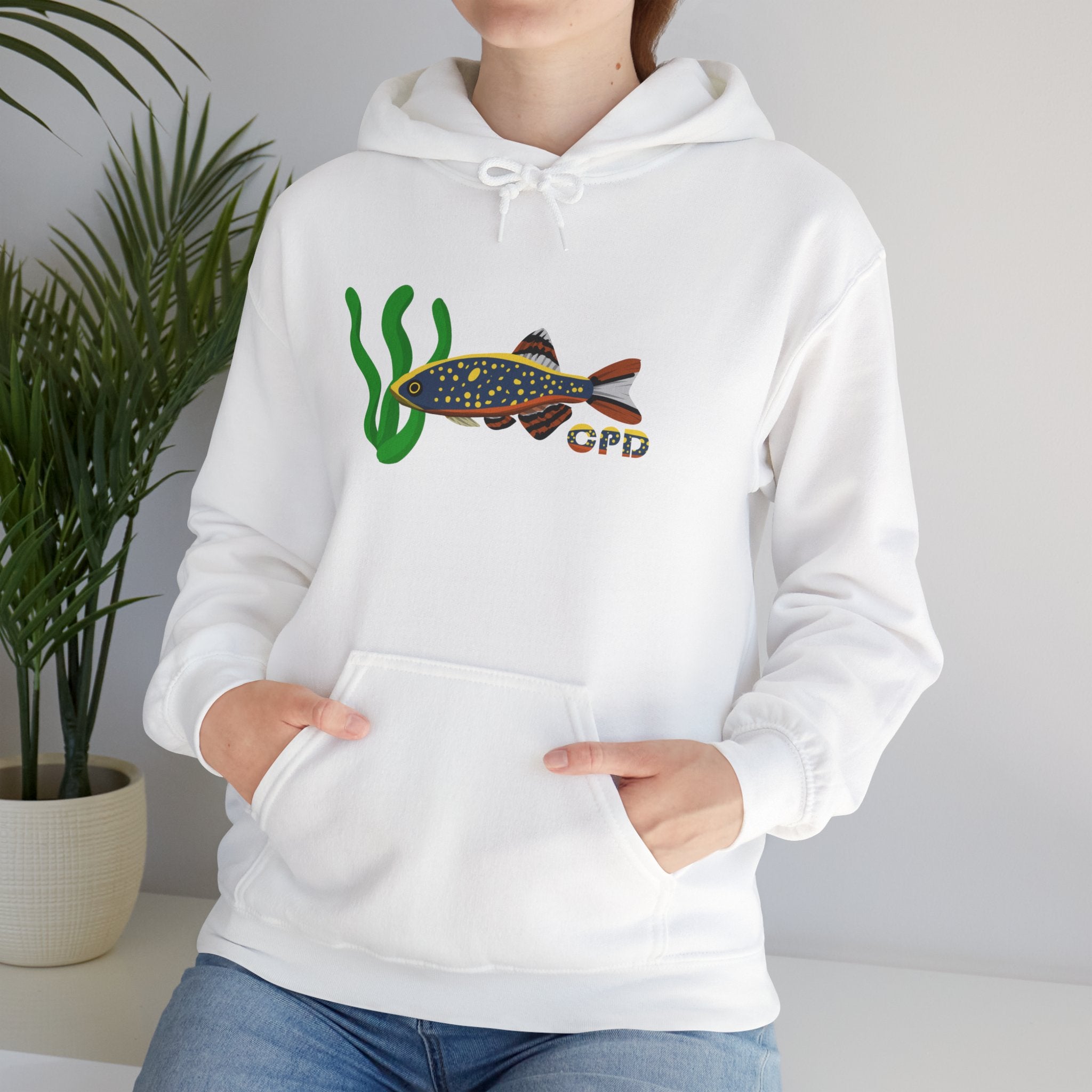 White Celestial Pearl Danio hoodie with fish and seaweed graphic worn by model