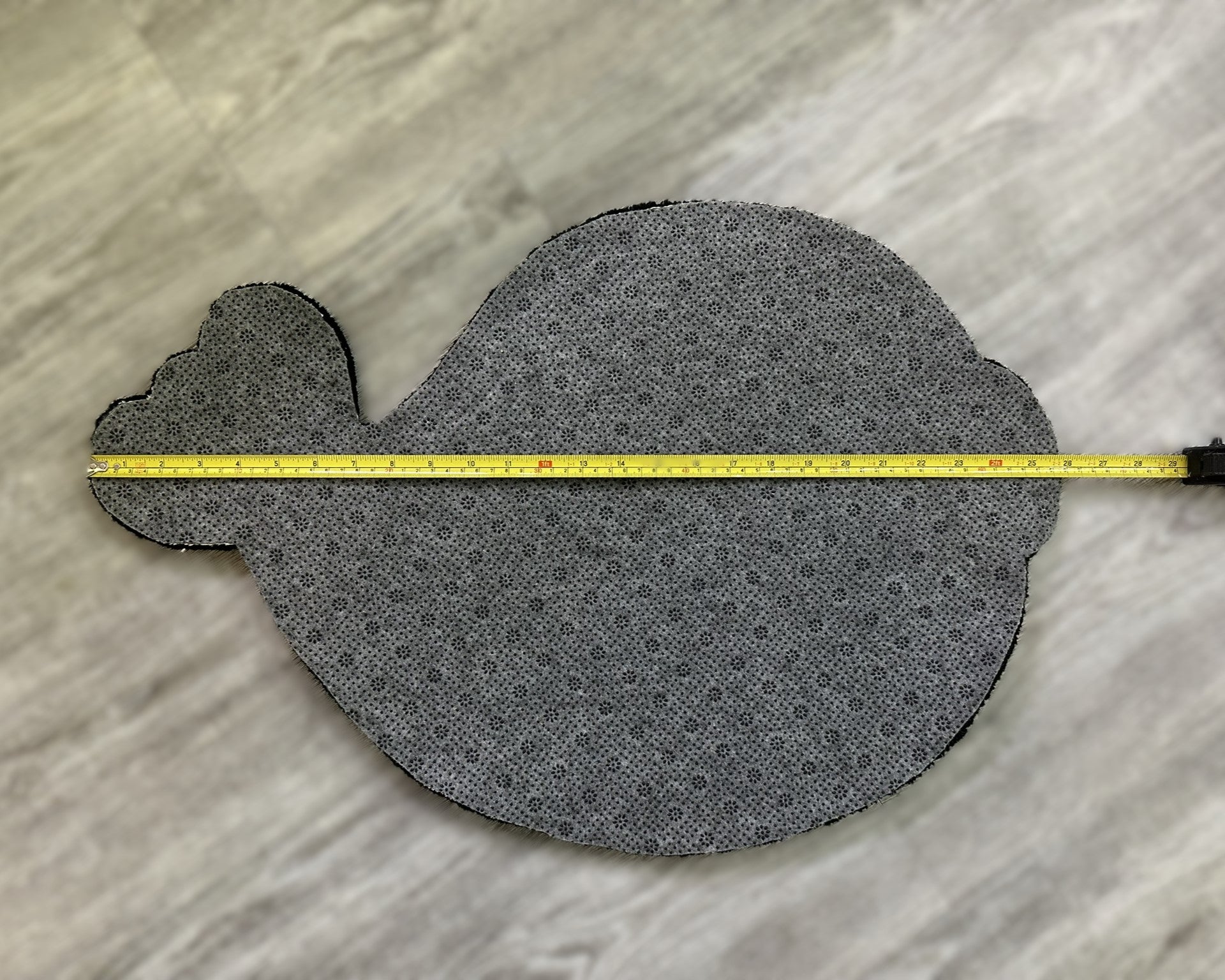 Scallywags Fish Bowl Cute Fish Rug with non-slip backing laid flat on floor showing length