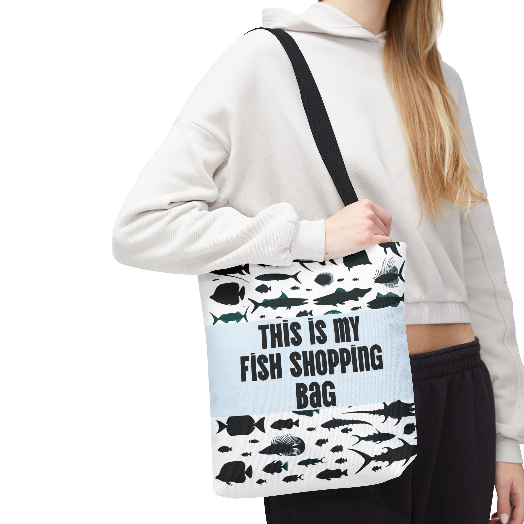 Fun fish-print tote bag with black fish silhouettes and text this is my fish shopping bag