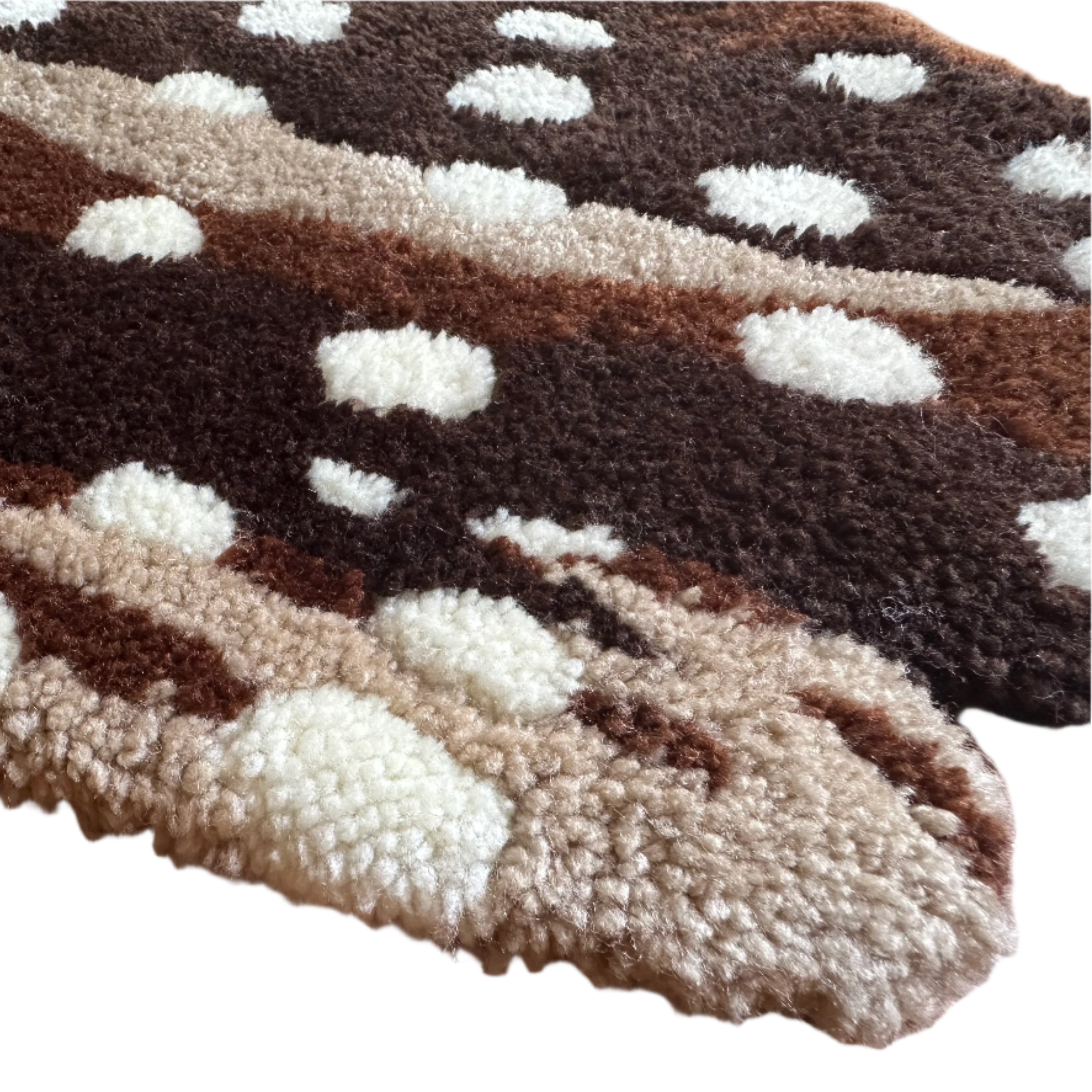 Close-up of Scallywag's Fish Bowl handmade pleco rug with textured brown and white patterns