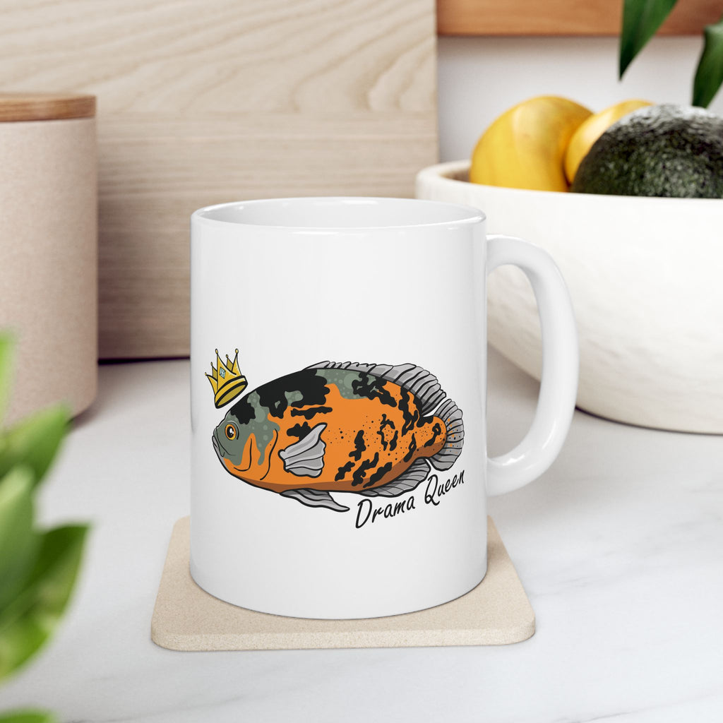 White mug featuring a colorful Oscar fish with a crown and Drama Queen text Oscar fish mug gift