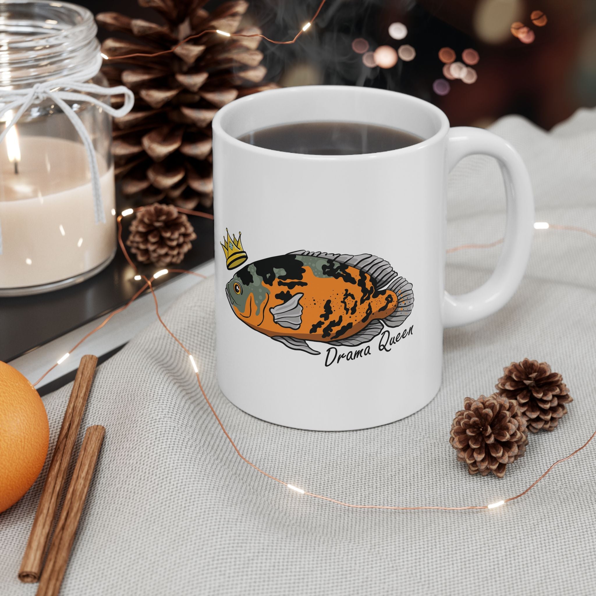 White mug with colorful Oscar fish design and text Drama Queen perfect Oscar fish mug gift