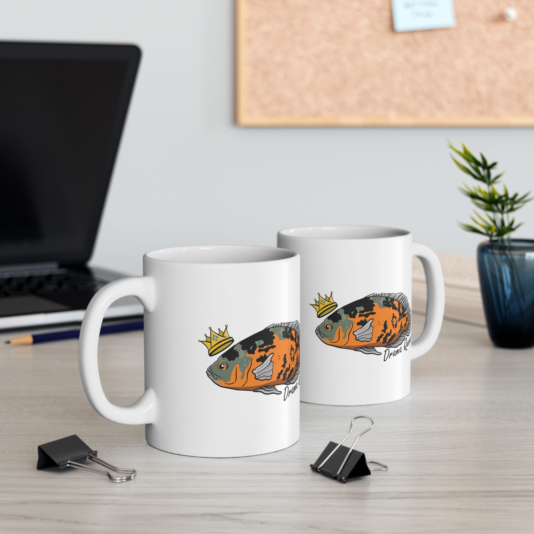 Oscar fish mug gift featuring colorful fish with a crown on a white ceramic mug