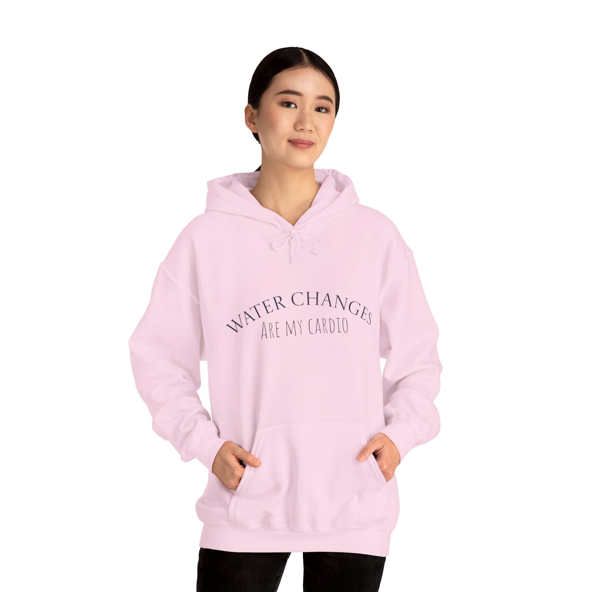 Person wearing a pink hoodie with text on a white background