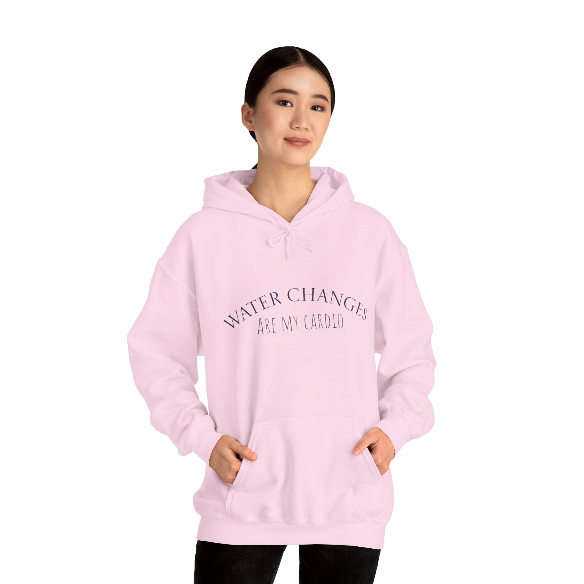 Person wearing a pink hoodie with text on a white background