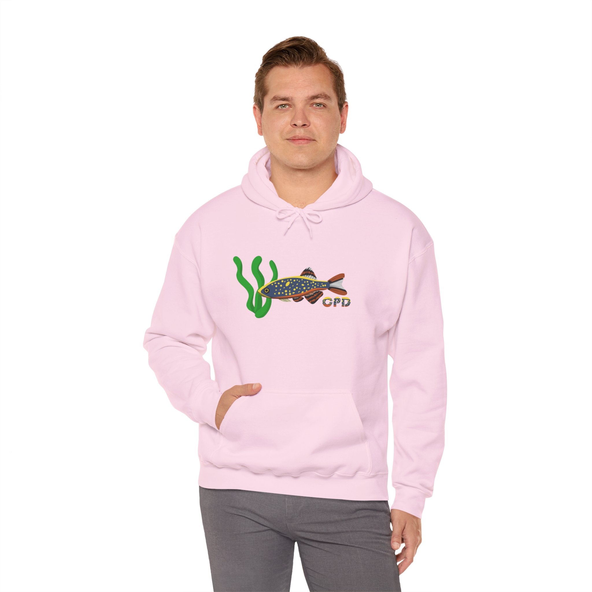 Man in pink hoodie with Celestial Pearl Danio fish on chest, hand in pocket