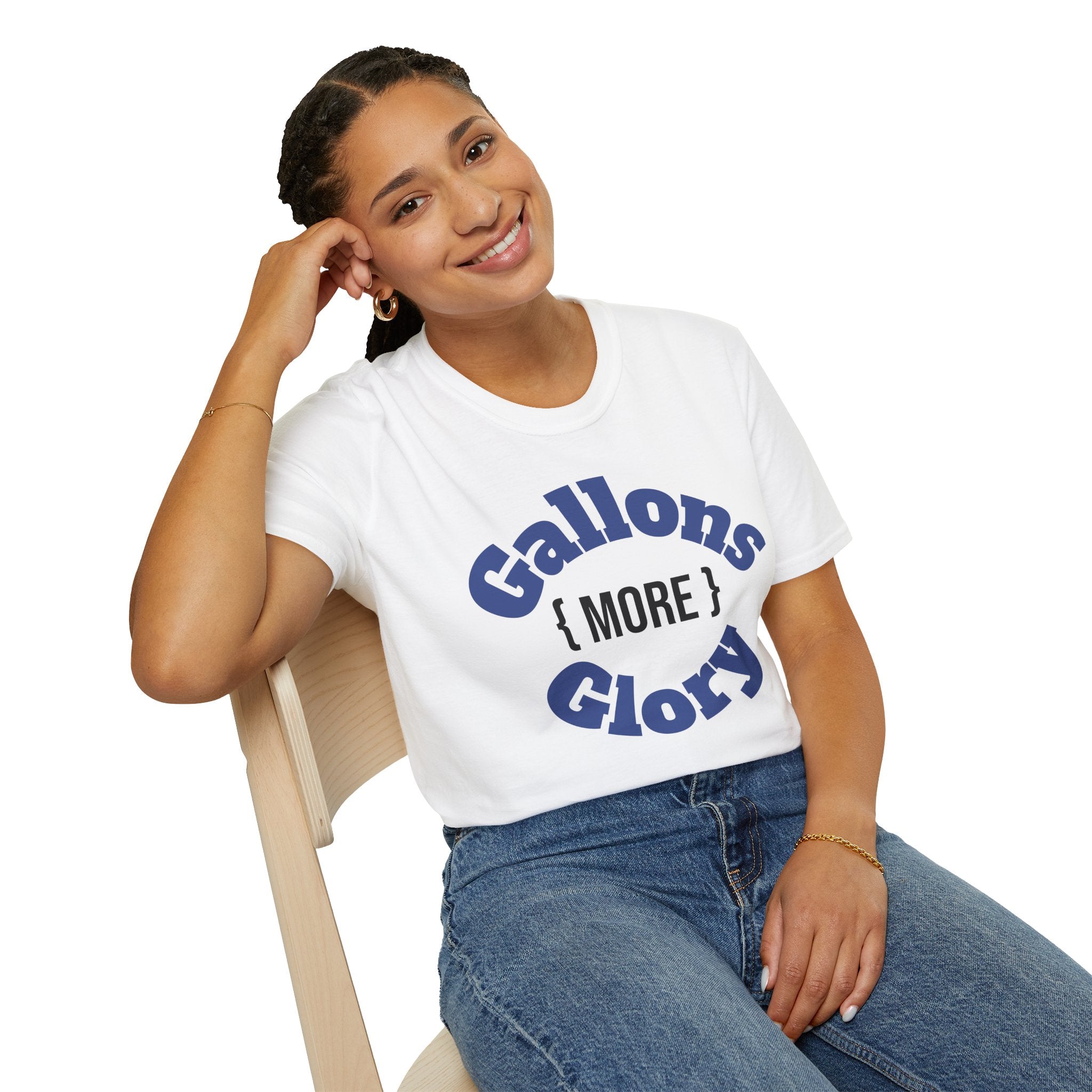 White monster tank hobbyist t-shirt with Gallons More Glory graphic worn by smiling woman seated on chair