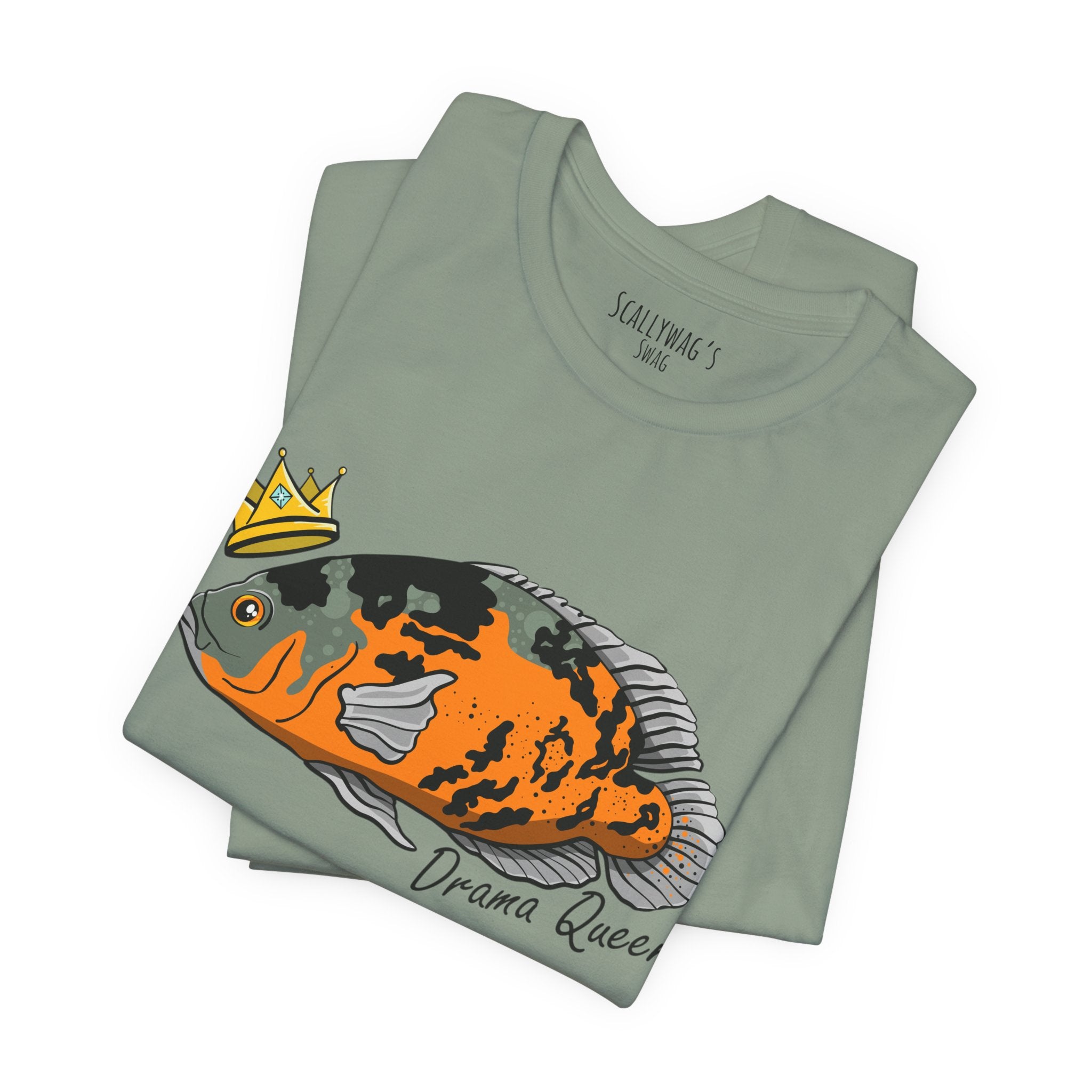 Drama Queen Oscar Fish T-Shirt by Printify with a colorful crowned fish graphic on a folded light green tee