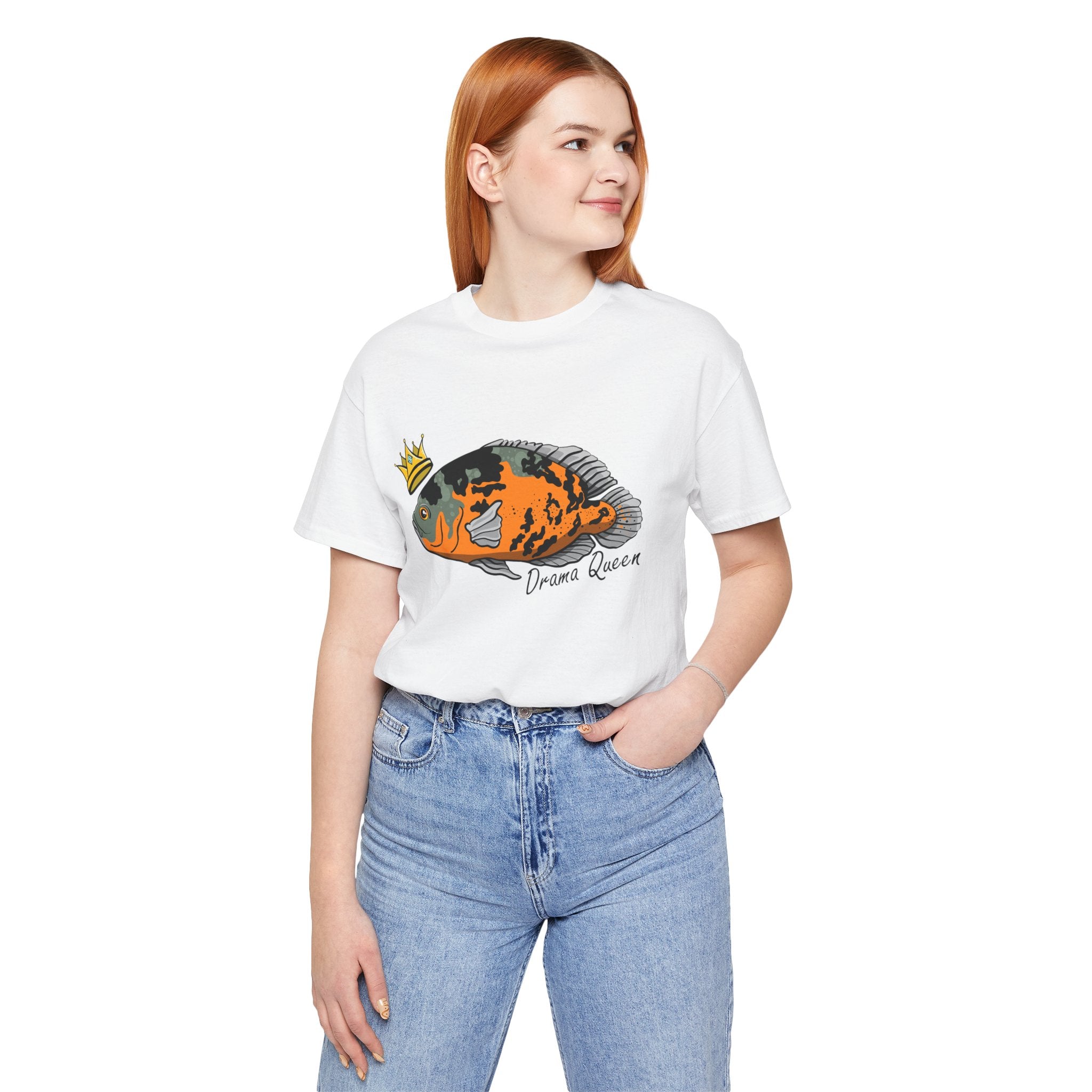 Woman wearing a white Drama Queen Oscar Fish T-Shirt with graphic fish design and blue jeans